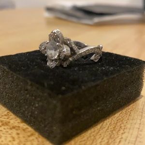 One of a Kind! Custom Rose Petal Diamond encrusted all around engagement ring!